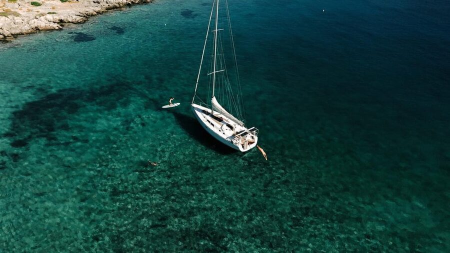 Agios Nikolaos: Golden Hour Sailboat Tour with Wine & Snacks - Leaving the marina and crossing Mirabello Bay