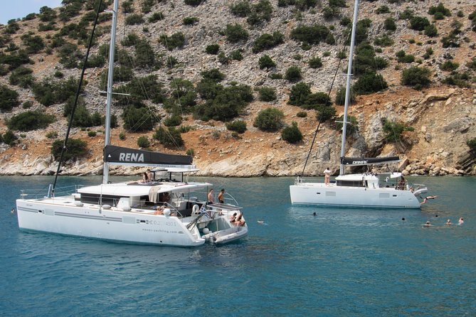 All-Inclusive Catamaran Day Cruise - Stop two: clear water, rocks, and snorkeling