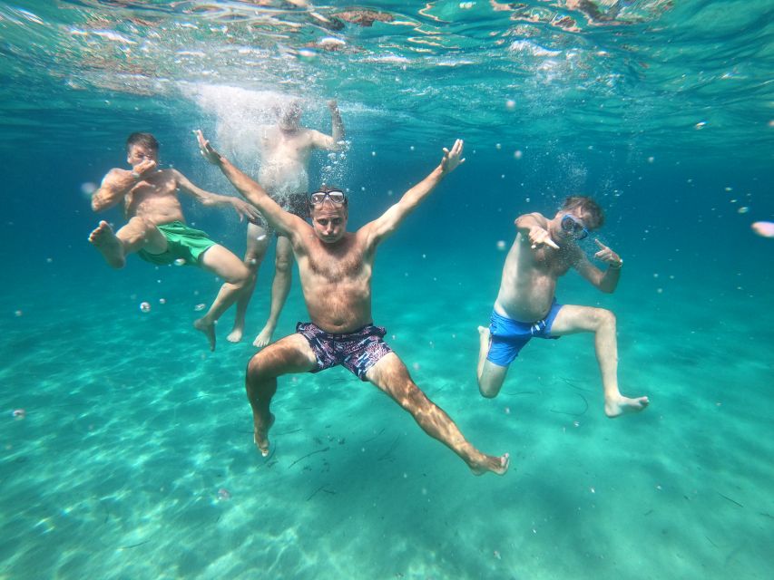 Athens: Catamaran Cruise with Fresh Lunch and Wine - Swimming, snorkeling, and the practical side of the water stops