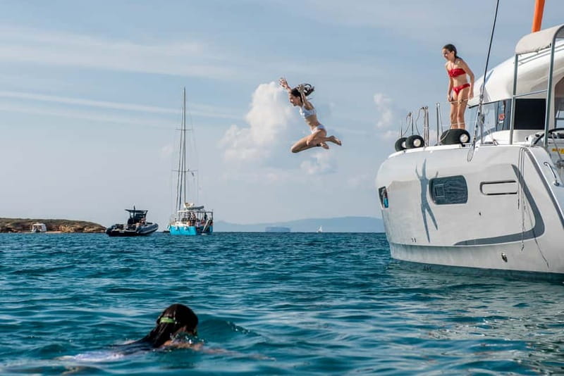 Athens: Half-Day Morning Catamaran Cruise with Meal & Drinks - The catamaran and crew shape the day