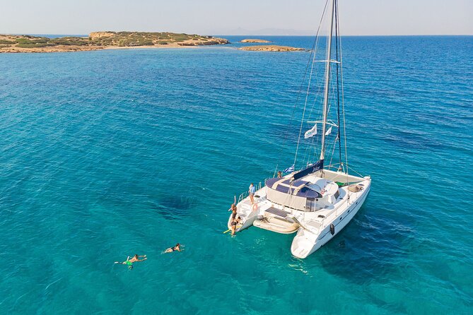 Athens Private Full day Catamaran cruise with meal & drinks - Agia Marina, the first long swim stop
