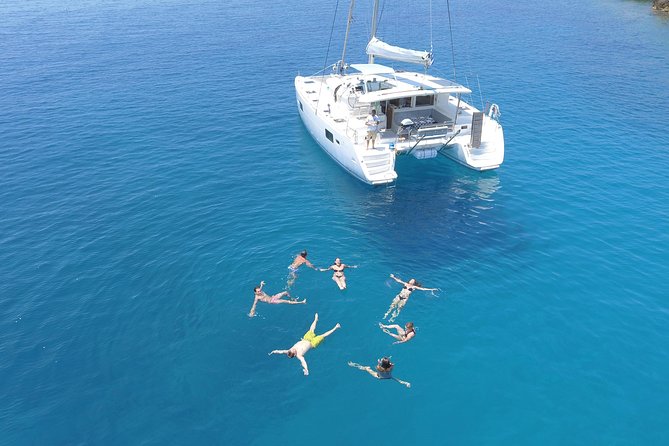 Athens Private Luxury Catamaran Cruise with Traditional Greek Meal and BBQ - Snorkeling at the second stop