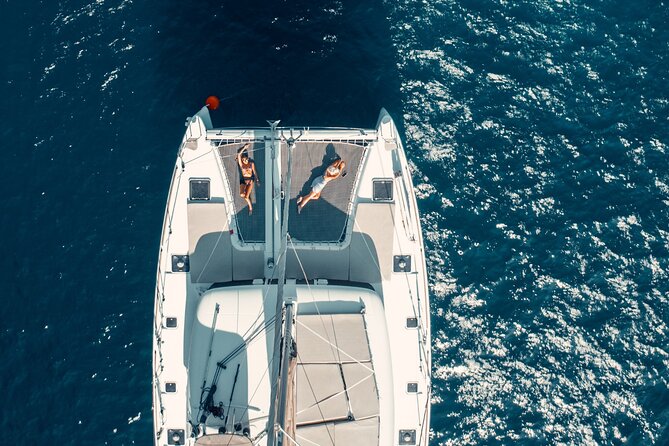 Beautiful Day Catamaran Caldera Cruise incl. Meal & Drinks - Why seeing Santorini from the sea matters
