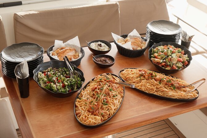Catamaran Cruise to Dia Island with Meal and Water Activities - Lunch on deck, with Cretan flavors