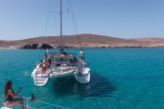 Catamaran Day & Sunset Cruises with meals Drinks and transportation - BAOS Island and the View Toward Delos