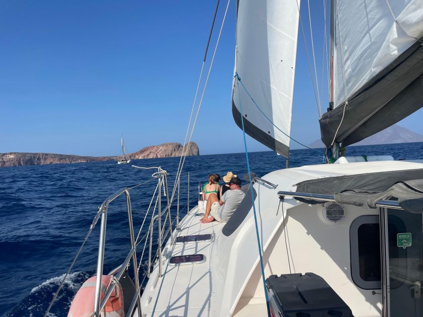 Catamaran Full Day Cruise - Starting at Adamas with Milos opening behind you