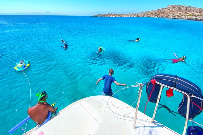 Chania: Private Day Catamaran Cruise with Swimming and Meal - A quiet bay near the Agioi Theodoroi Islands