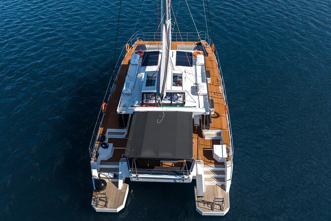 Comfort Max Catamaran Caldera Cruise with BBQ and Drinks - A five-hour view of Santorini from Ammoudi Bay