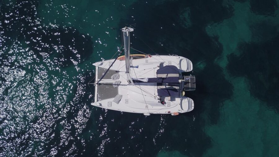 Corfu: Half Day Private Cruise on Lagoon Catamaran - Swimming, snorkeling, and the onboard water toys