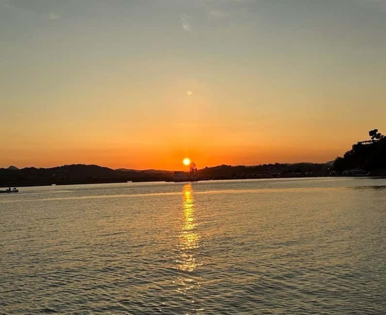 Corfu: Sunset Cruise on a Traditional Wooden Sailing Yacht - Pontikonisi at sunset