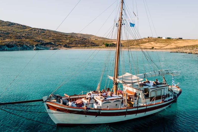 Corfu: Sunset Cruise on a Traditional Wooden Sailing Yacht - Drinks, local bites, and music on board