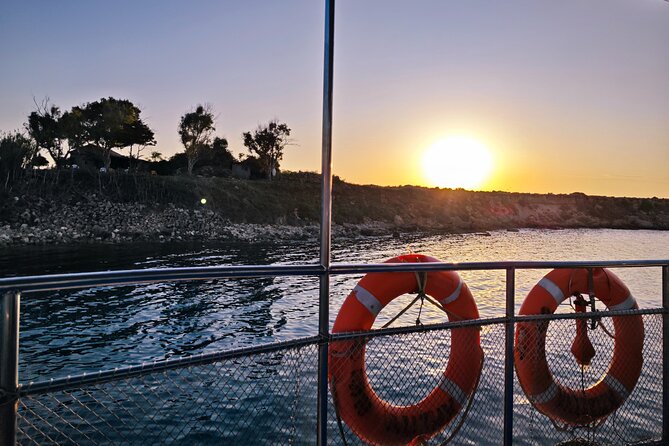 Dreamy Sails - Sunset Tour With Dinner And Wine - Xi Beach after dark