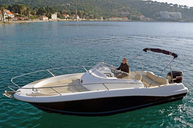 Explore Santorini and its volcanic wonders with Alex Private Boat - Santorini from the water, not the cliff top