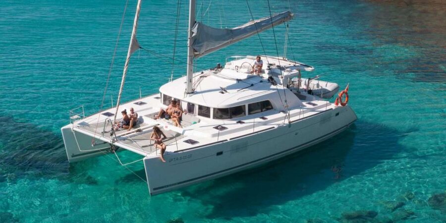 From Adamas: Milos and Poliegos Catamaran Cruise with Lunch - Sykia Cave and the western coast