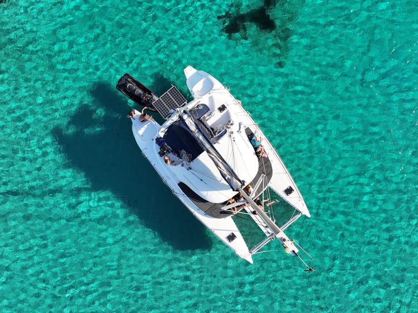 From Ornos: Mykonos Delos Catamaran Cruise with Meal & SUP - What to bring and what to expect