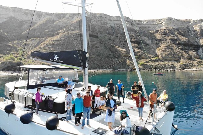 Half-Day Exclusive Catamaran Cruise in Santorini with Meal and Open Bar - Food quality and the social side of the boat