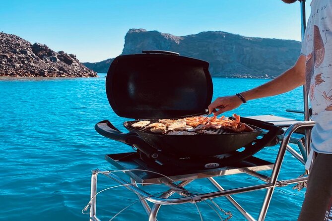 Half-Day Exclusive Catamaran Cruise in Santorini with Meal and Open Bar - The return route and the old port of Fira