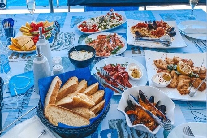 Half-Day Exclusive Catamaran Cruise in Santorini with Meal and Open Bar - The price and what you get for $133.02