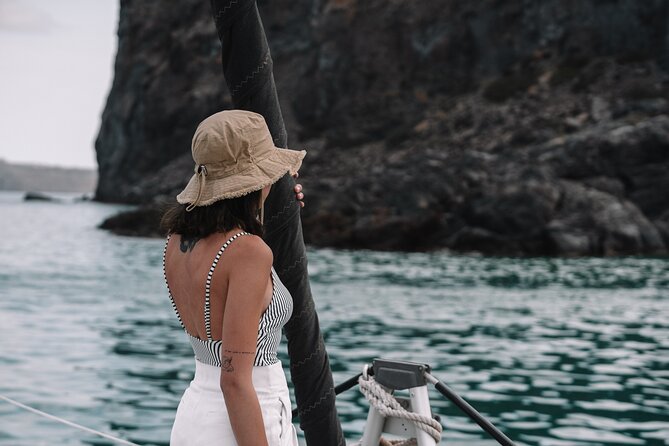 Half-Day Tailor-made Private Catamaran Cruise in Santorini - Old Harbor and Oia are viewed from the water