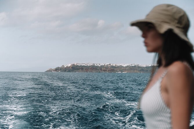Half-Day Tailor-made Private Catamaran Cruise in Santorini - Red Beach gives you 20 minutes of strong photographs