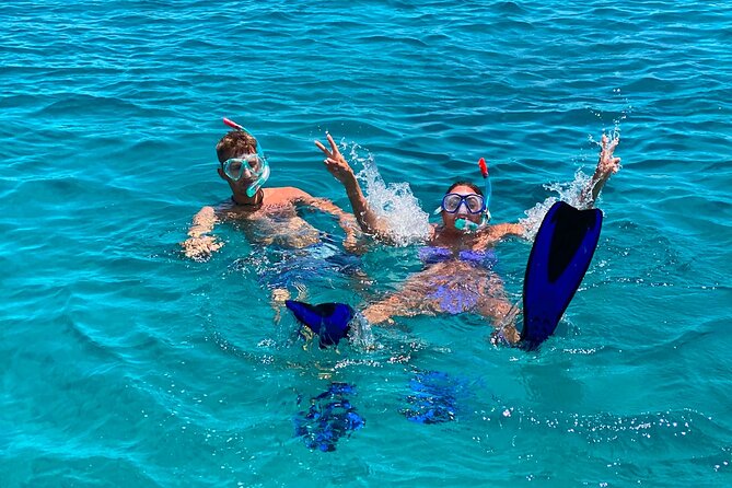 Heraklion: Catamaran Cruise to Dia with Sunset, Meal & Bar - Swimming and water sports in Dia Bay