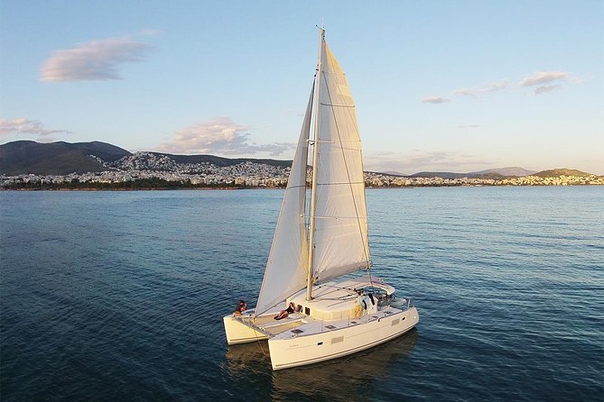 Luxury Catamaran Cruise from Athens with Traditional Greek Meal and BBQ - The sunset return to Alimos Marina