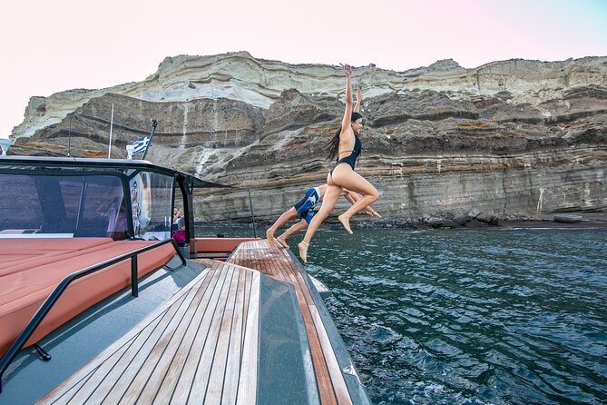 Luxury Private Power Catamaran Tour in Santorini - Sunset sailing and the onboard mood