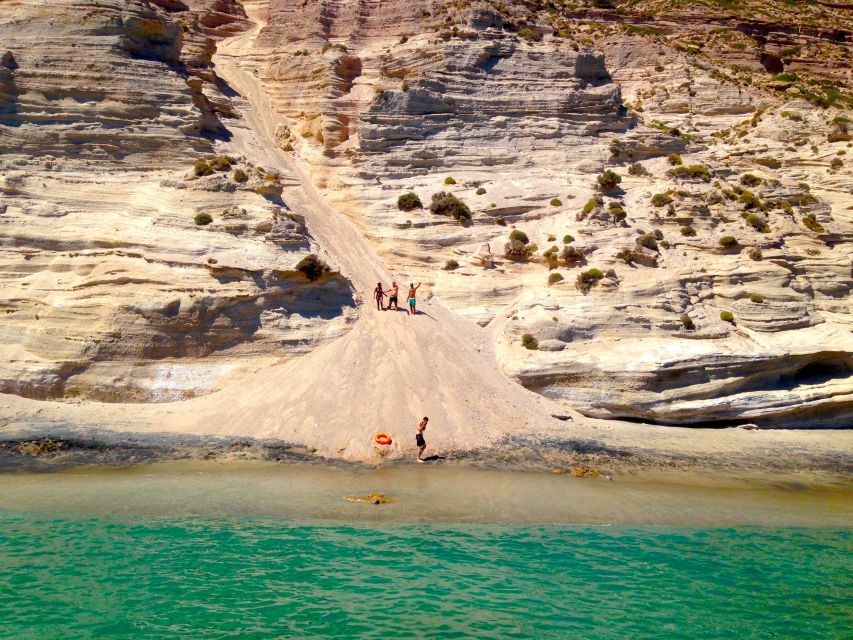 Milos: Full-Day Catamaran Cruise to Poliegos and Kleftiko - The colorful sirmata villages from the water