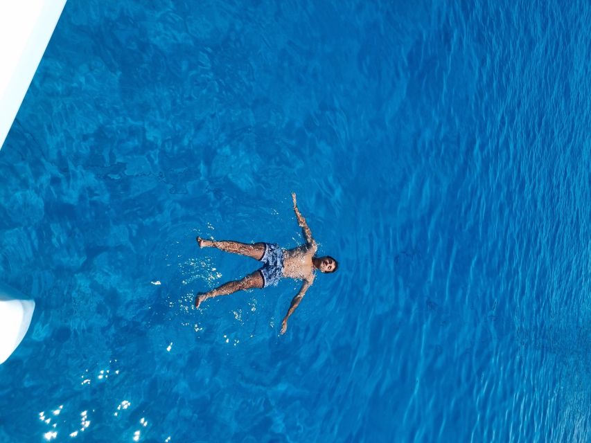 Milos: Full-Day Catamaran Cruise with Food and Open Bar - Tsigrado and the volcanic south coast