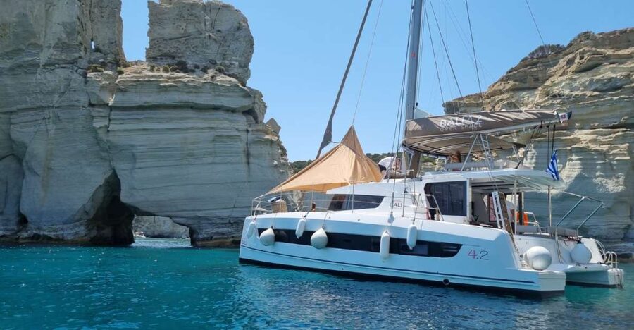 Milos: Full-Day Catamaran Cruise with Food and Open Bar - Meeting the Together catamaran in Adamantas