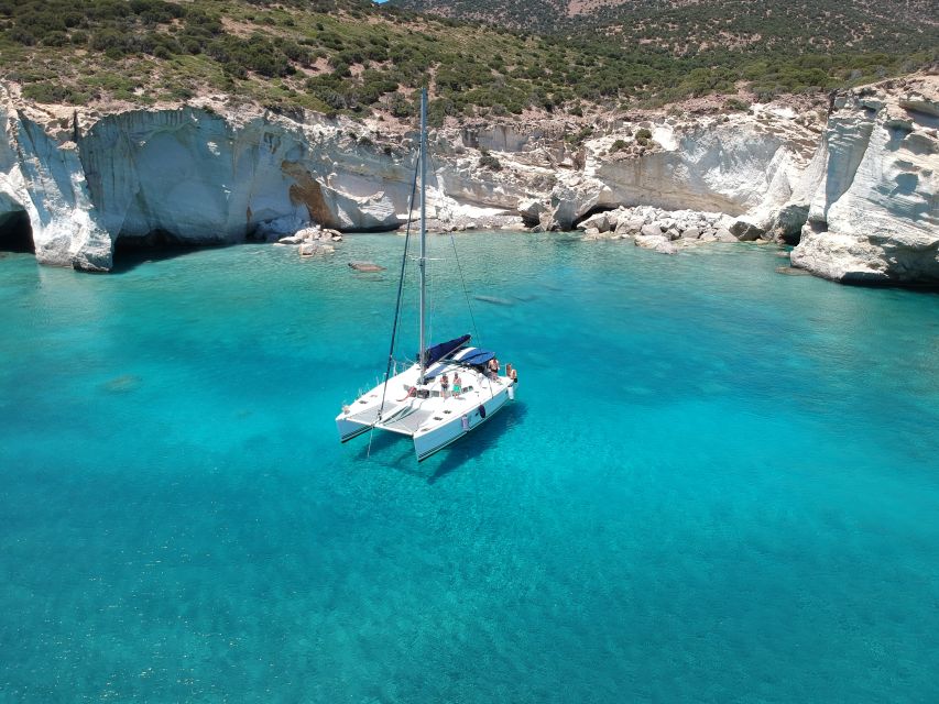 Milos: Full-Day Catamaran Cruise with Paddle Board - Wind changes are part of the experience