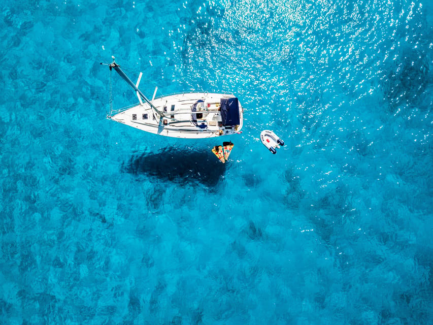 Milos: Full-Day Kleftiko Poliegos Sailboat Tour with Lunch - Agathia starts the swimming rhythm