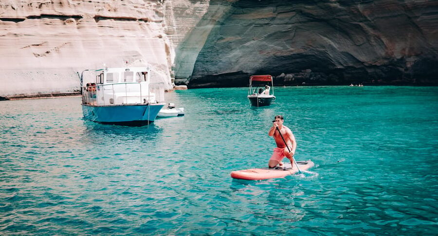 Milos: Kleftiko Morning Catamaran Cruise with Lunch & Drinks - Starting in Adamantas with coffee and local bites