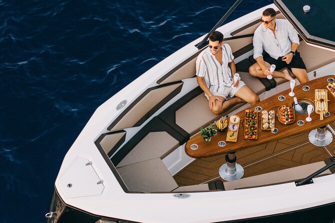 ❖ Milos: Small Group Yacht Tour—Kleftiko Sarakiniko Poliegos - Leaving Agia Kiriaki with the weather in charge