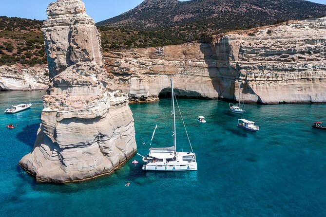 Milos Sunset Catamaran Cruise to Kleftiko Bay with Meal & Drinks - From Adamantas to Klima and Cape Vani