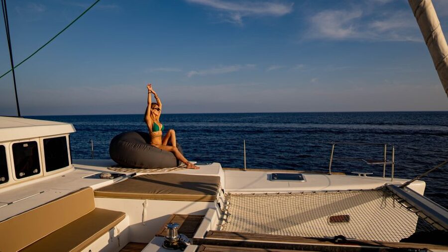 Mykonos: Boho Experience Catamaran Cruise - Sailing with Delos in view