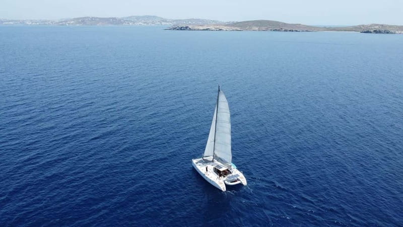 Mykonos: Catamaran Cruises with Lunch and Drinks - Choosing between Rhenia and Mykonos’s southern coast