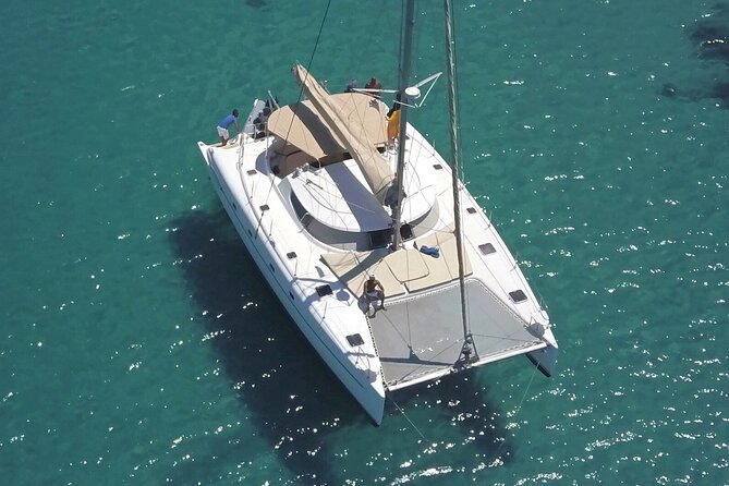 Mykonos Catamaran Private Day Cruise, Full Lunch & Open-bar - Rhenia’s quiet coves and the swimming stops