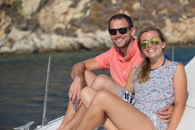 Mykonos Catamaran Private Sunset Cruise, Full Meal & Open-Bar - Rhenia coves, clear water, and the first swim