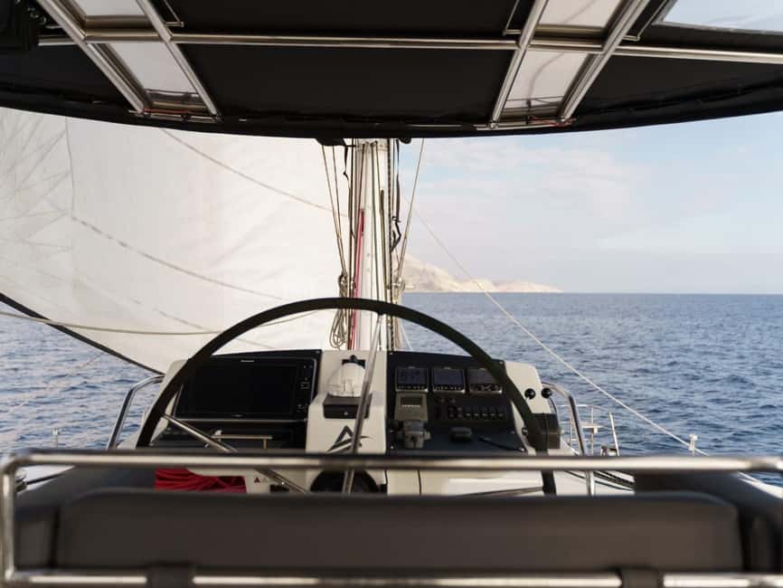Mykonos Cruise: Prosecco, BBQ, Sailing Demo & Delos Stop - Timing, clothing, and small practical tips