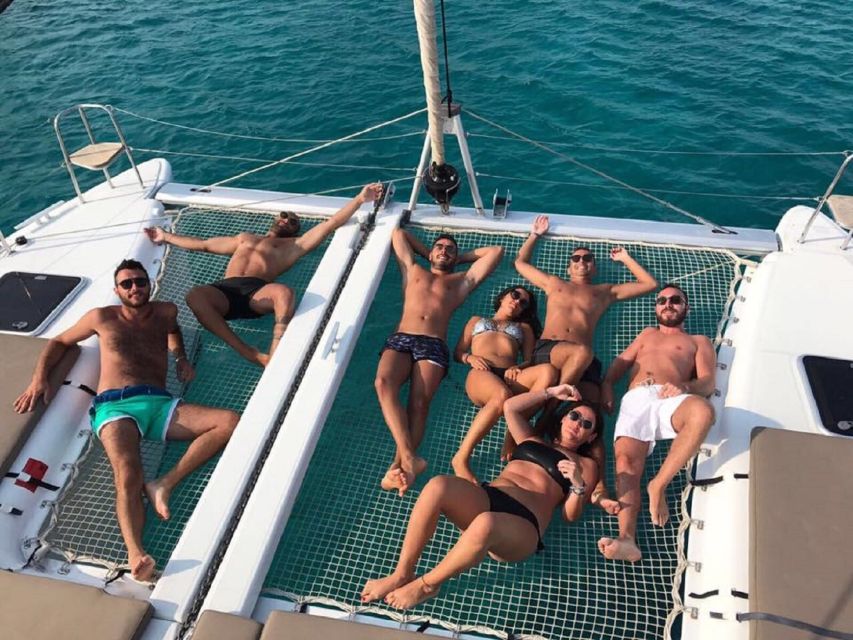 Mykonos: Full-Day Catamaran Cruise with Fresh Lunch - Delos and Rhenia when the weather allows