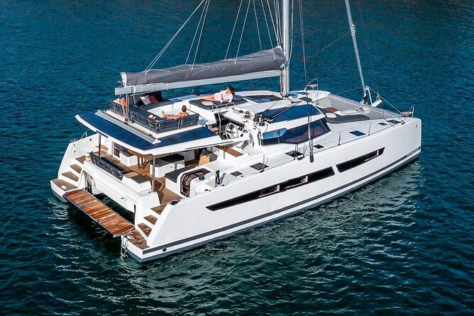 Mykonos: Luxury Catamaran Cruise with Meal, Drinks & Transport - Boarding at Agia Anna and getting settled