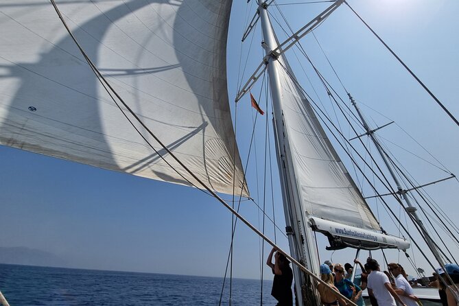 Mykonos Sail Cruise to Rhenia, Guided Tour of Delos, Lunch&Drinks - Delos: temples, markets, and a sacred island