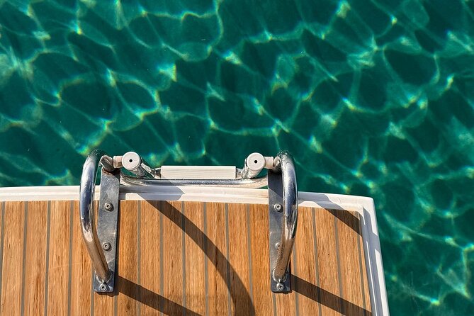 Mykonos Shared Catamaran Tour Experience - Two quiet hours at Rhenia