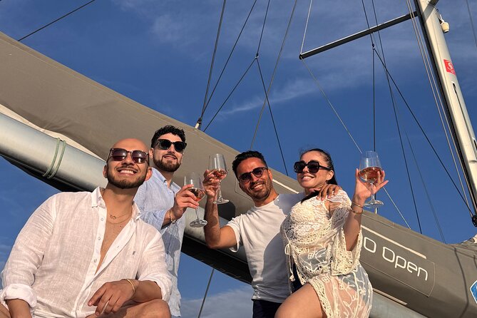 Mykonos Shared Catamaran Tour Experience - Greek food, drinks, and the crew