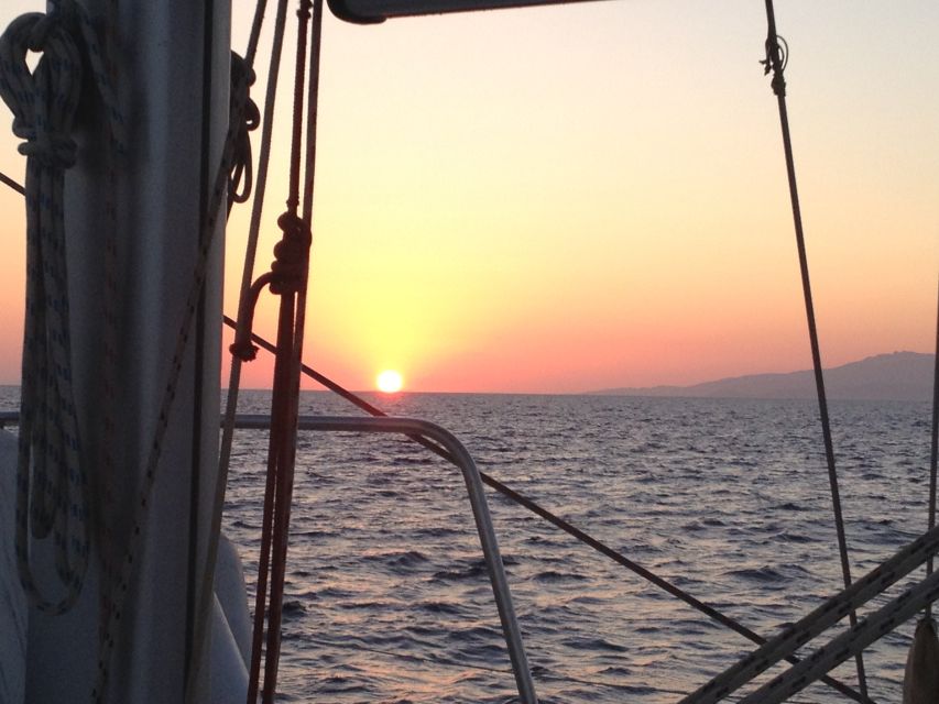 Mykonos: Sunset Sail Cruise to Rhenia, Beach Hopping, Dinner - Two hours of swimming and snorkeling from the yacht