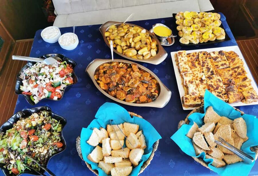 Mykonos: Sunset Sail Cruise to Rhenia, Beach Hopping, Dinner - Group size, boat comfort, and crew service