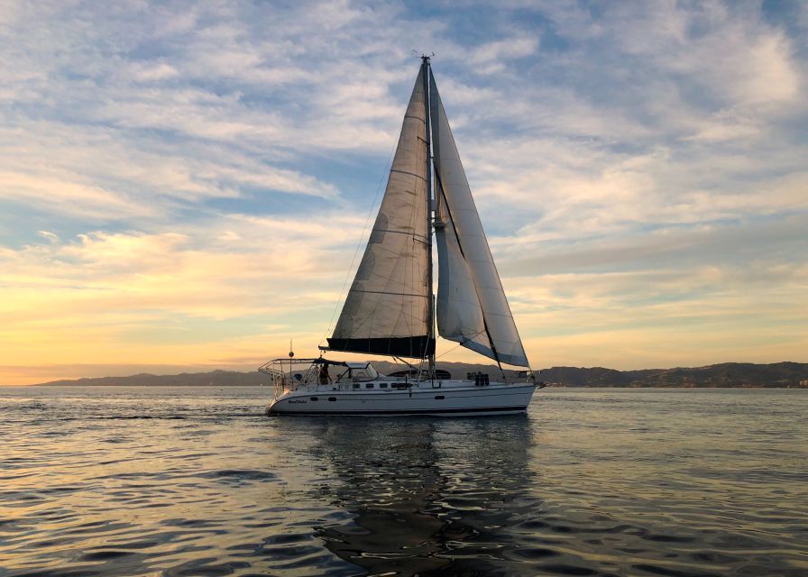 Nydri: Full-Day Sailing Cruise with Swim Stops & Meal - Leaving Nydri with coffee and island views