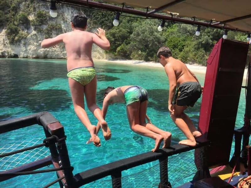 Nydri: Sailing Through History. Daily Cruise with Beach BBQ - Skorpios, Madouri, and the final swim