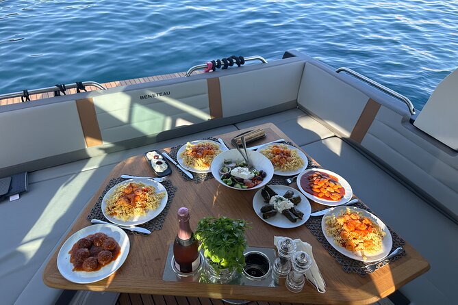 Private Caldera Cruise with Motor Yacht in Santorini - Thirassia, cliffs, and the best meal setting